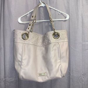 Steve Madden big shoulder purse, creamy tan color with gold accents.